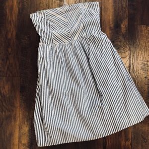 Cutest strapless dress! Fits like a Large.